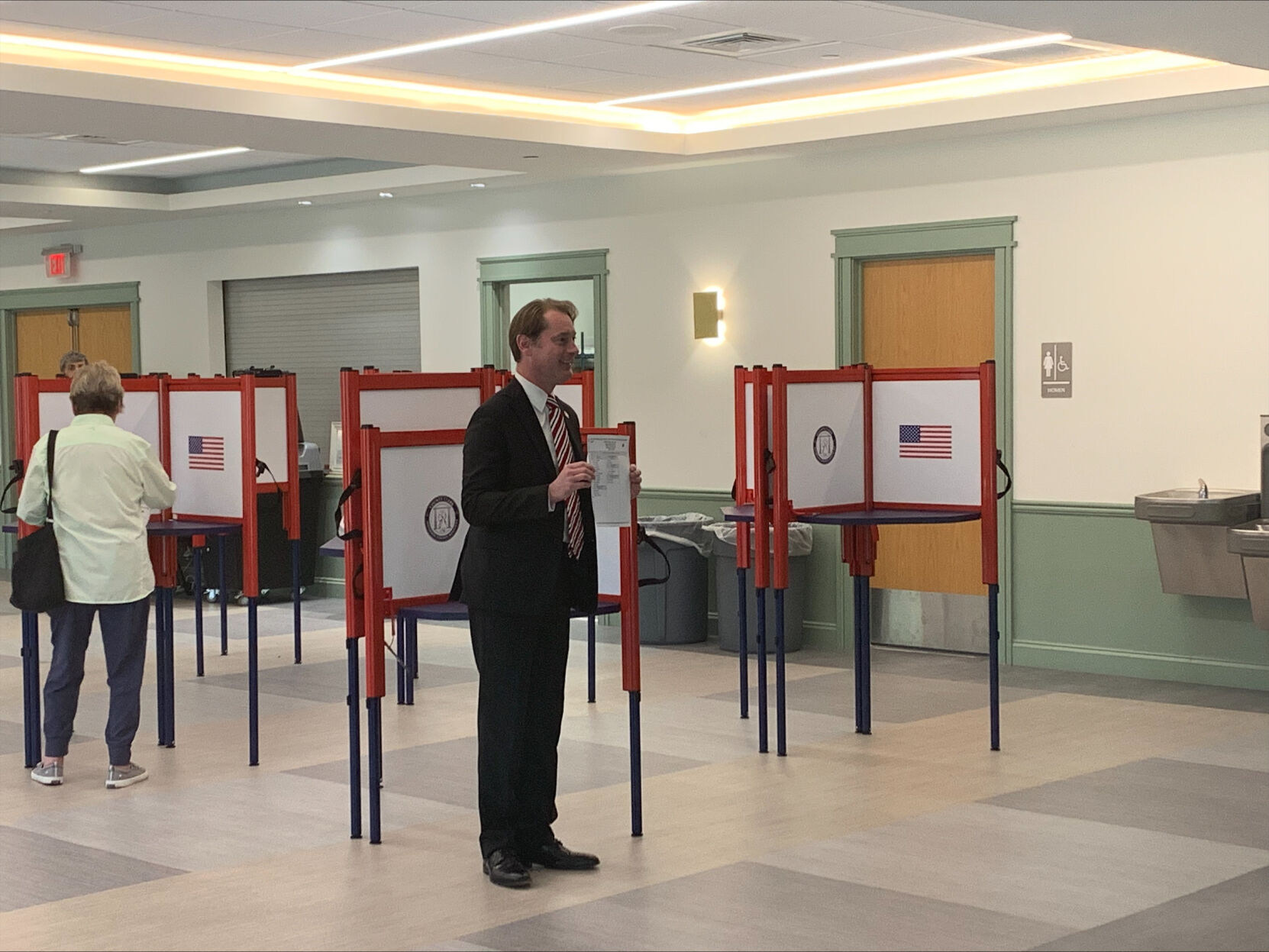 Secretary of State Michael Adams displays complete ballot for Kentucky's primary